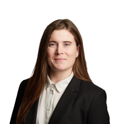 Professional headshot of woman in black blazer