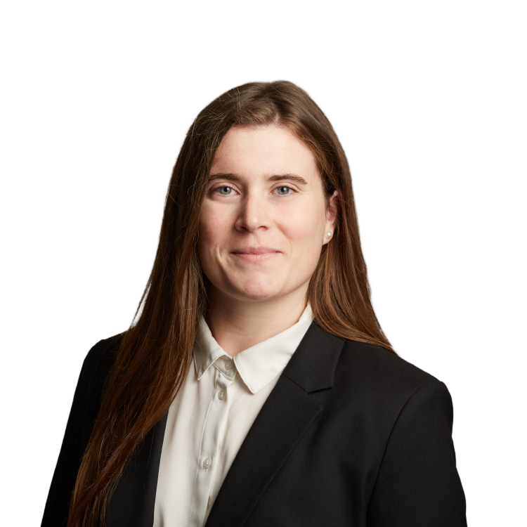Professional headshot of woman in black blazer