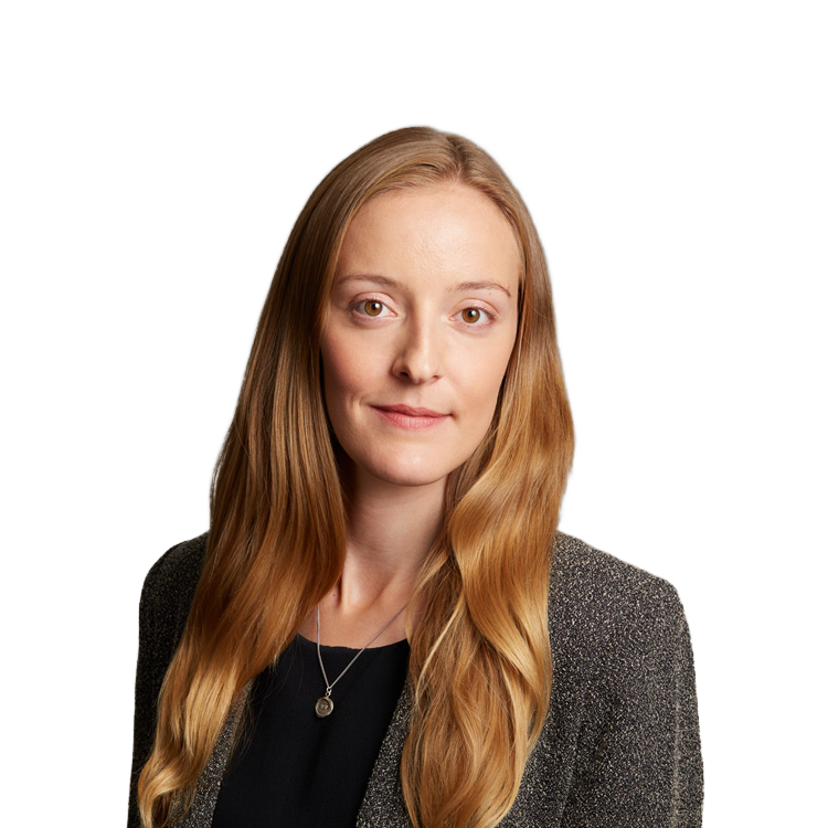 Professional headshot of woman with long blonde hair