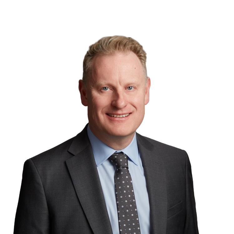 Smiling businessman in suit and tie headshot