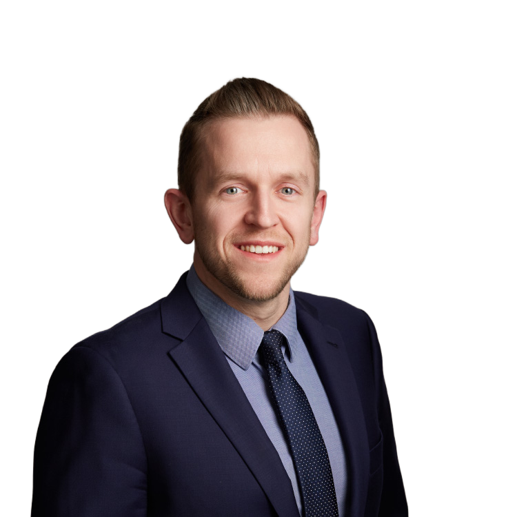 Smiling man in navy suit and tie portrait