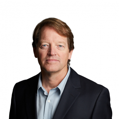 Professional headshot of middle-aged man in blazer