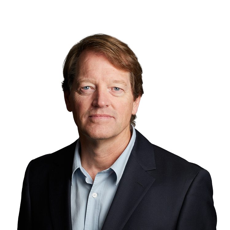 Professional headshot of middle-aged man in blazer