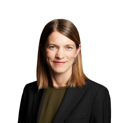 Professional headshot of woman in dark blazer