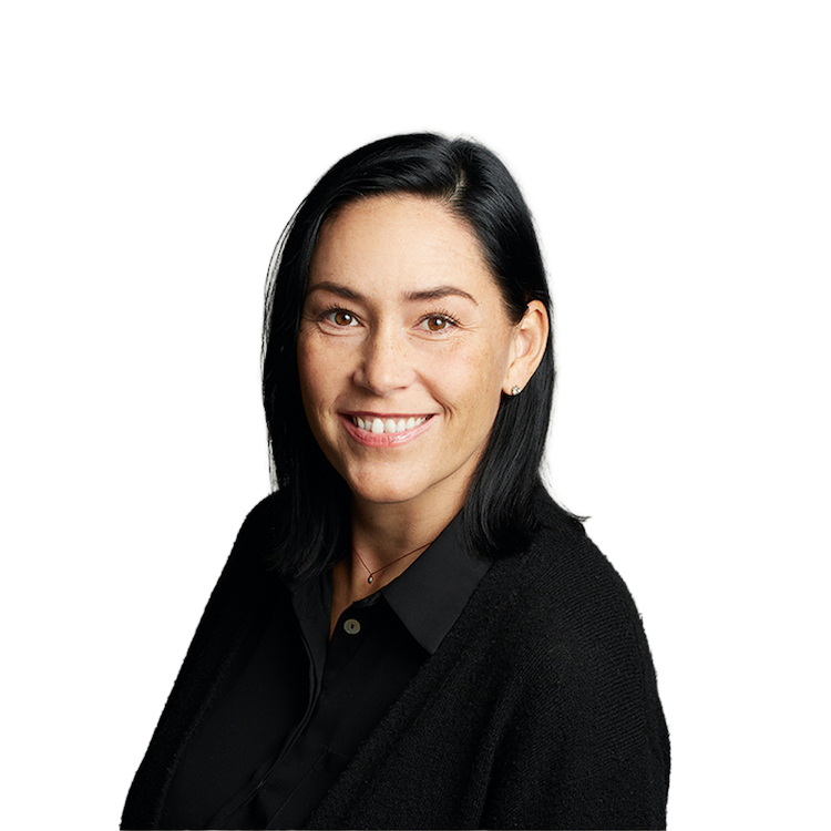 Professional headshot of smiling woman with dark hair