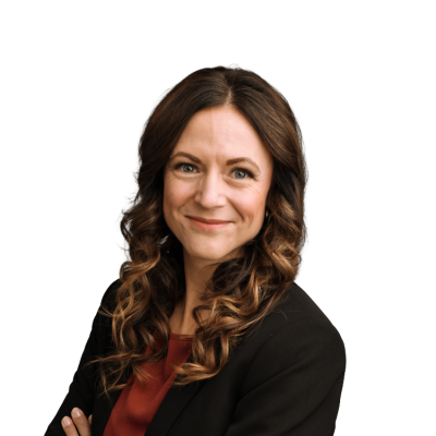 Professional headshot of smiling woman in black blazer